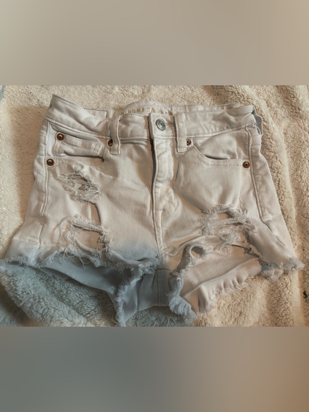 American Eagle Outfitters White Distressed Denim Shorts (high-rise)
